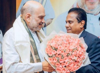 Dr. Velu with Mr. Amit Shah